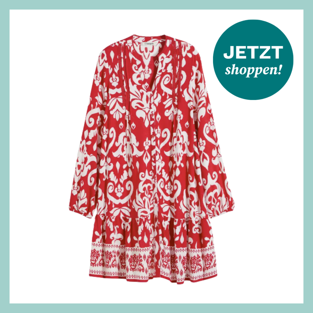 Gemustertes und luftig geschnittenes Kleid mit langen Ärmeln.