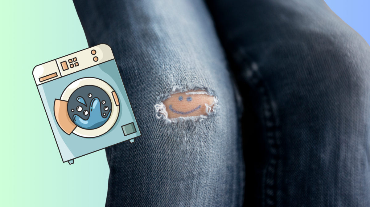 Jeans mit einem Loch am Knie und daneben eine Waschmaschine