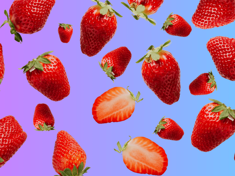 Bunter Hintergrund mit Verlauf, zu sehen sind viele rote frische Erbeeren