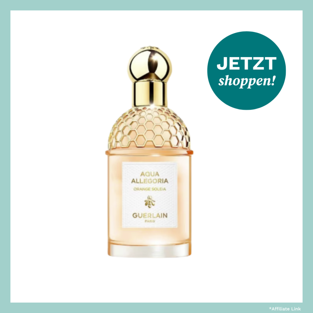 Durchsichtiger Flakon mit goldenem Deckel.