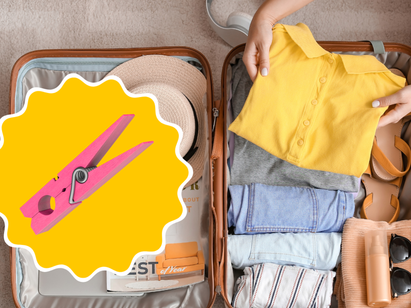 Koffer für den Urlaub wird gepackt, darauf gelber Kreis mit Wäscheklammer