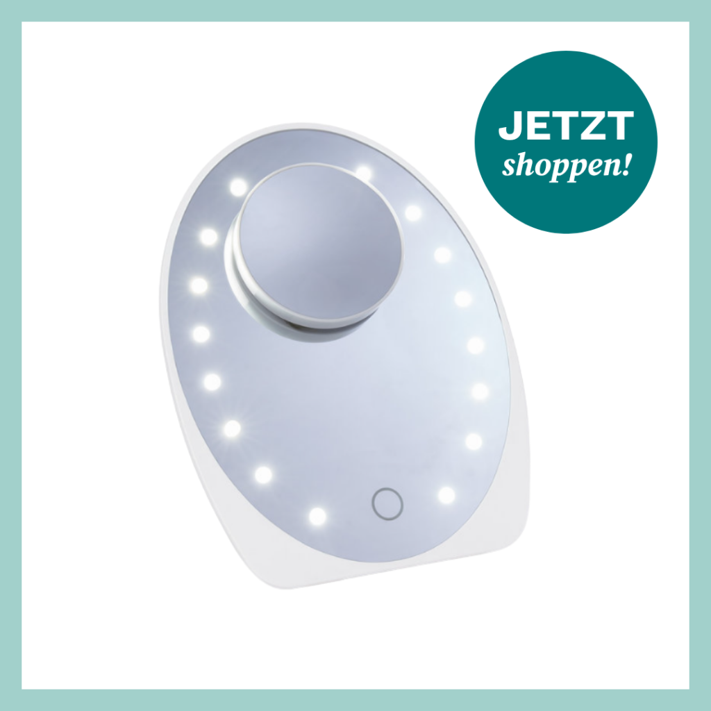 Ovaler Stand-Kosmetikspiegel für die tägliche Schminkroutine.