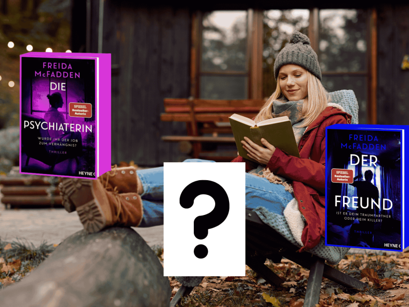 Frau liest im Herbst draußen ein Buch.