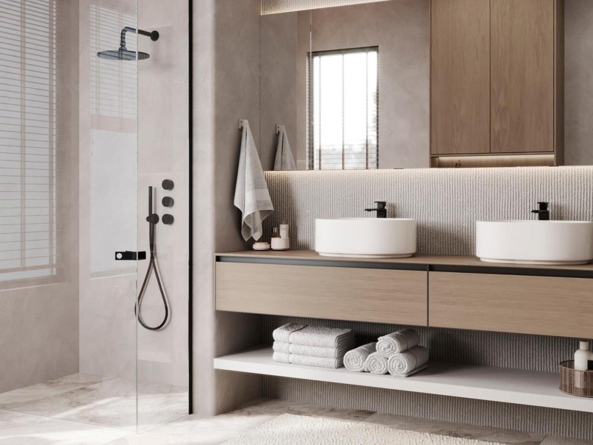 Modernes Badezimmer mit wei&szlig;en Handt&uuml;chern.